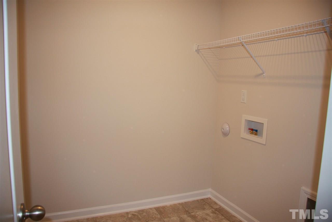 1154 Chestnut Bluff Apex, NC 27502 - Photo 15 of 26 a view of a rack