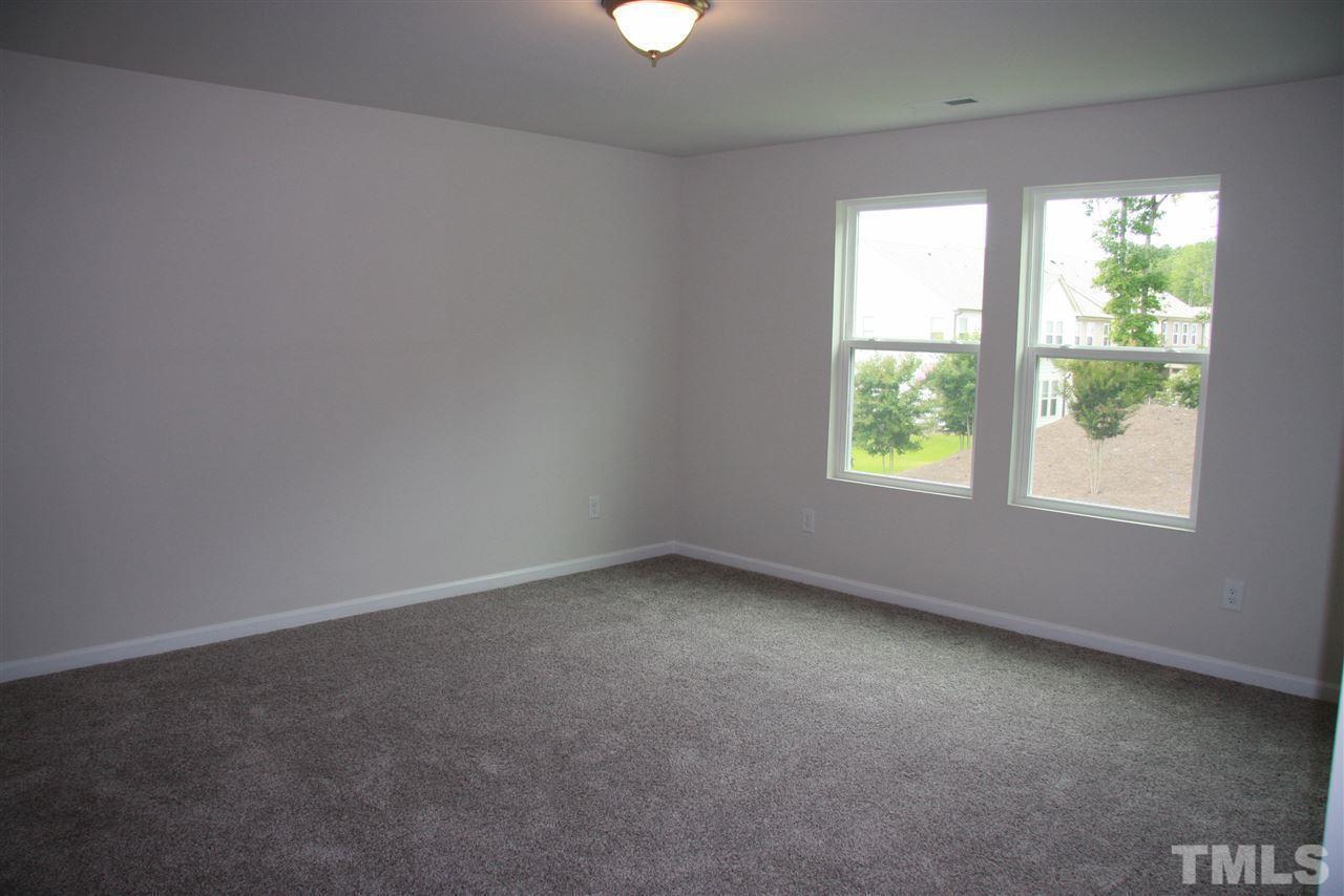 1154 Chestnut Bluff Apex, NC 27502 - Photo 16 of 26 an empty room with a window