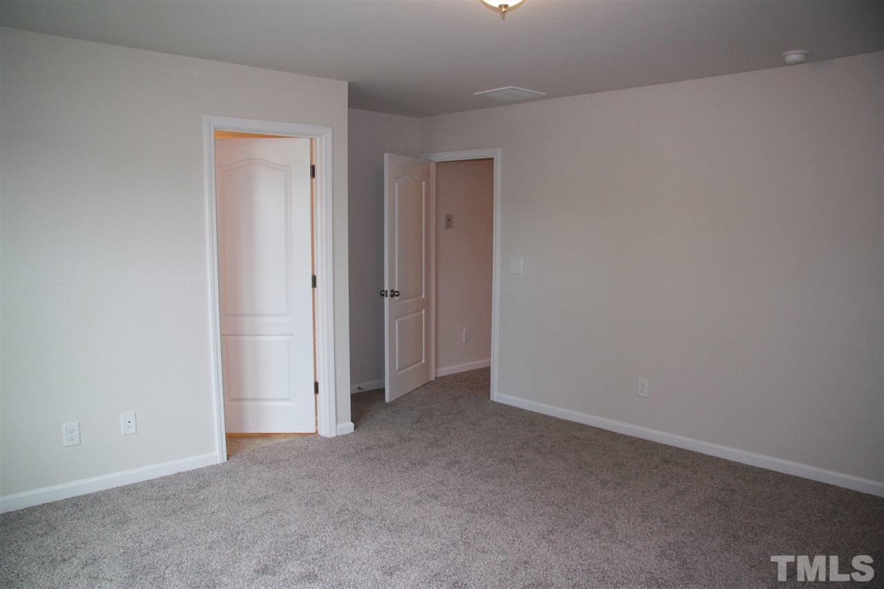 1154 Chestnut Bluff Apex, NC 27502 - Photo 17 of 26 a view of an empty room