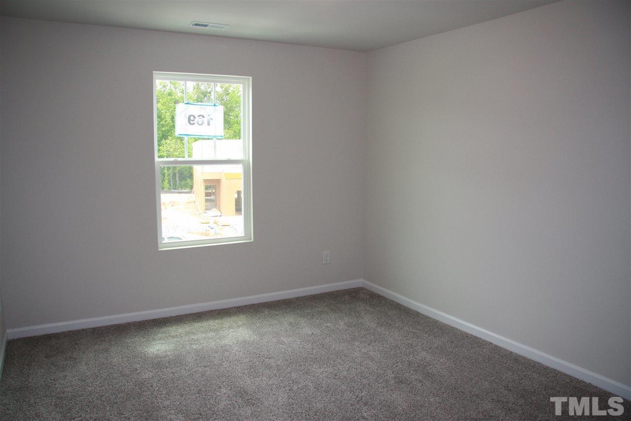 1154 Chestnut Bluff Apex, NC 27502 - Photo 22 of 26 an empty room with a window