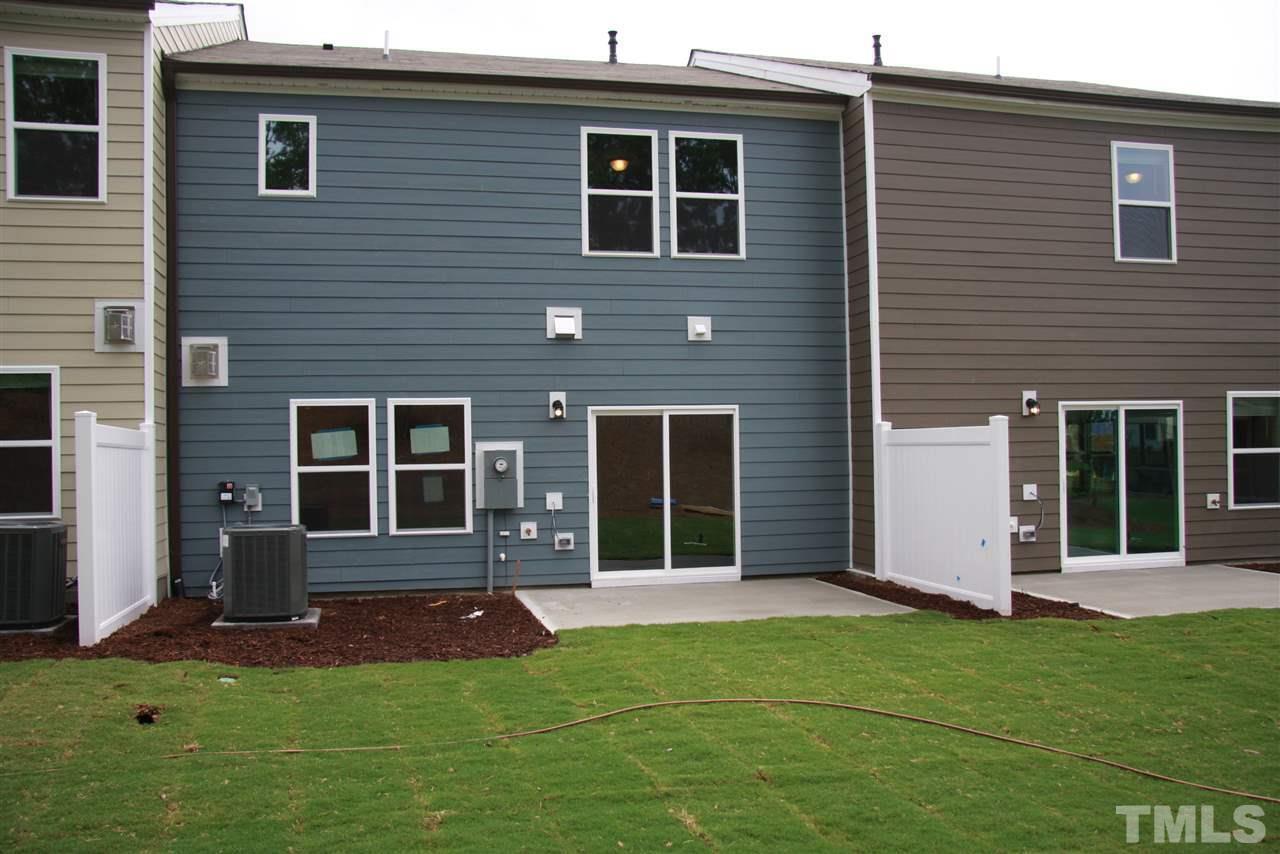 1154 Chestnut Bluff Apex, NC 27502 - Photo 25 of 26 a view of a house with yard