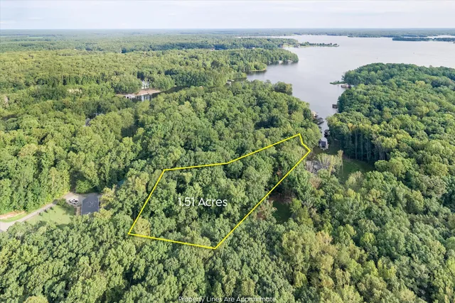 a view of a lake with a yard