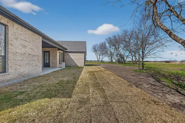 a view of a hall with chairs