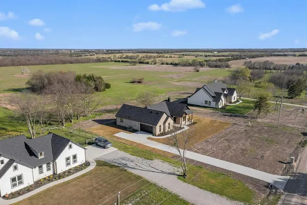 a view of a terrace with a yard