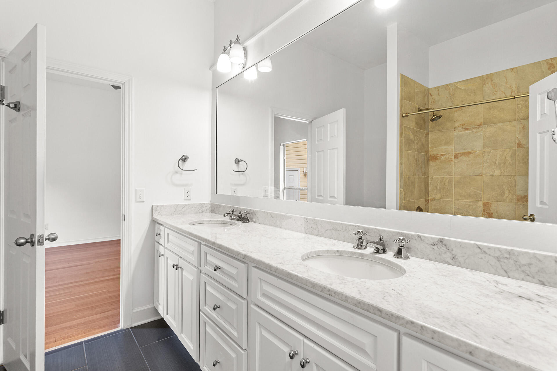 4460 Clipper Cove Destin, FL 32541 - Photo 22 of 37 a bathroom with a granite countertop sink double and mirror