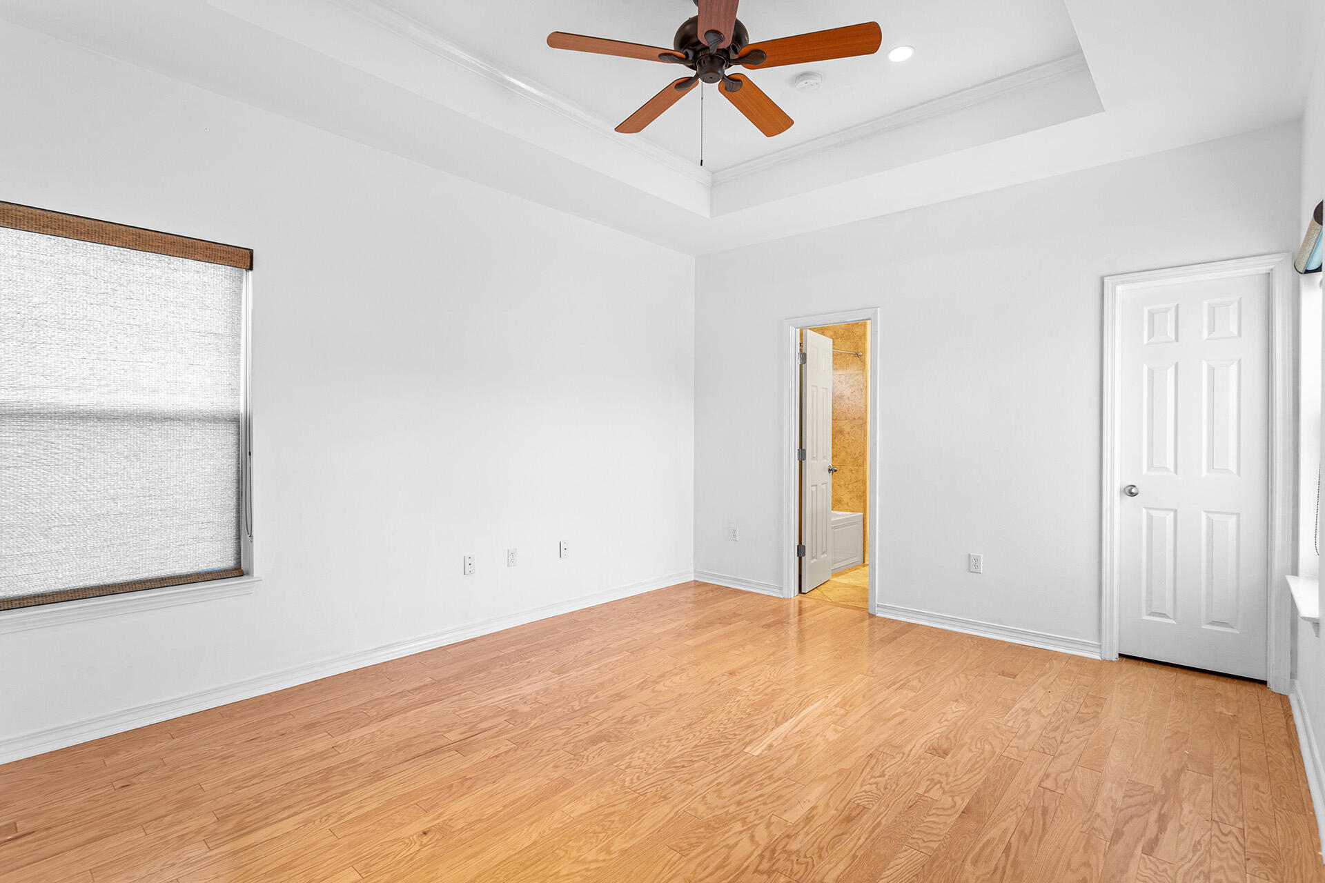 4460 Clipper Cove Destin, FL 32541 - Photo 24 of 37 an empty room with a window and a ceiling fan