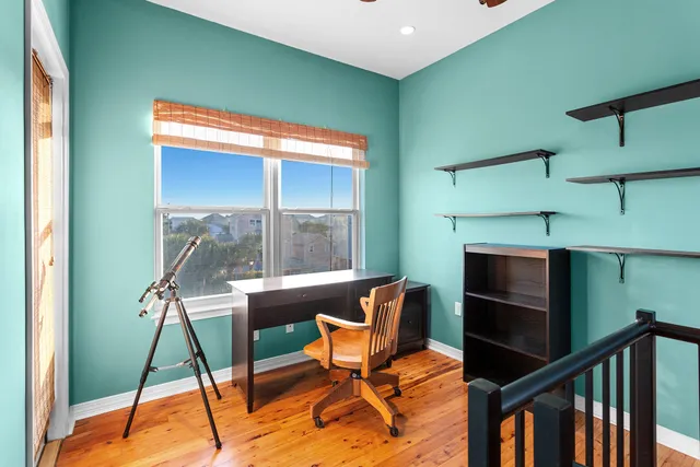 a balcony with chairs