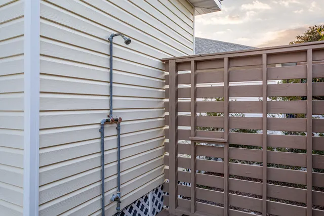 a bathroom with a shower and a sink