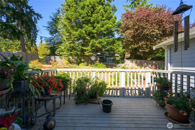 a view of a balcony with chairs