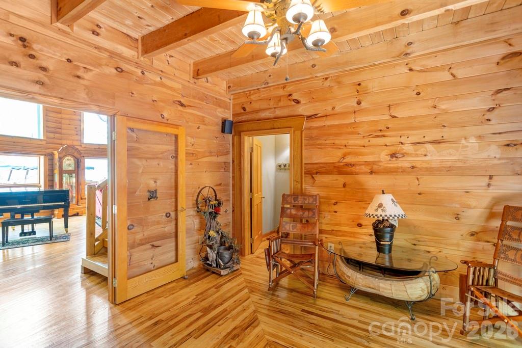 35 Falcon Crest Loop Maggie Valley, NC 28751 - Photo 5 of 46 a view of a entryway with furniture and wooden floor