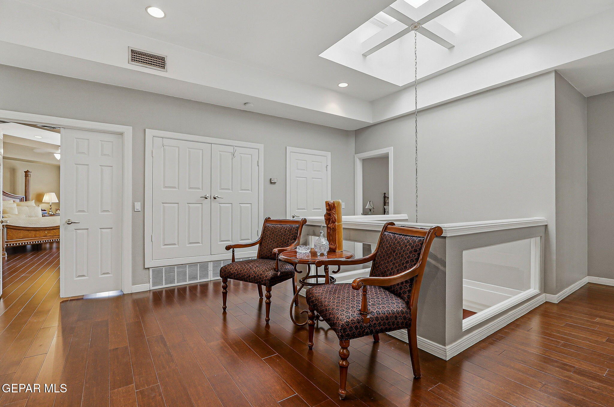 5806 Diamond Point Circle El Paso, TX 79912 - Photo 25 of 61 a view of a livingroom with furniture and wooden floor