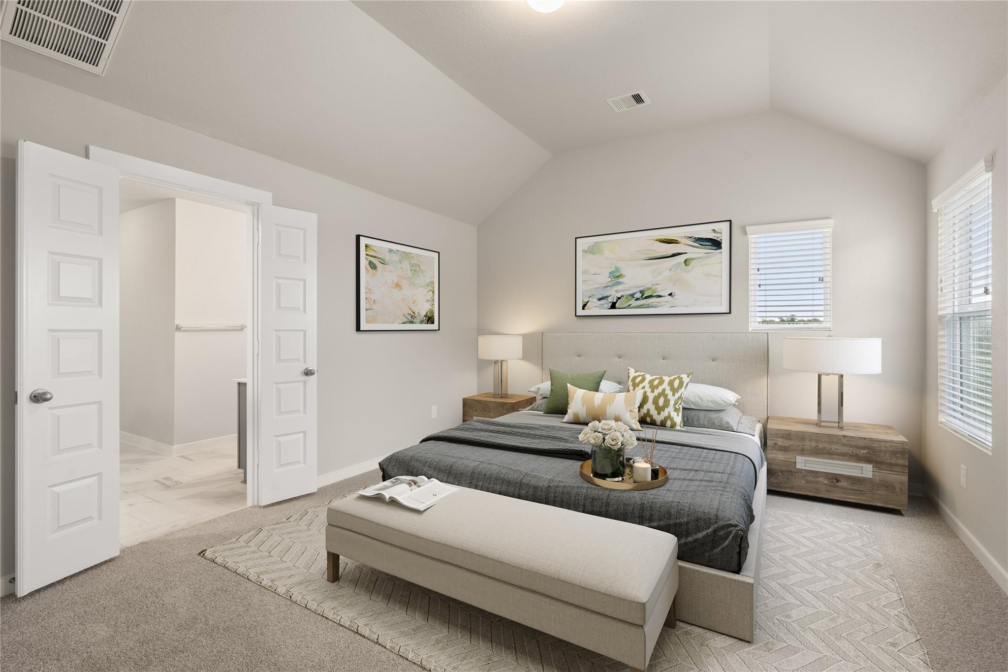2639 Finley Lane Rosenberg, TX 77471 - Photo 5 of 18 This spacious, bright bedroom features a high ceiling and neutral decor. It includes a large bed with decorative pillows, two windows for natural light, and an en-suite bathroom. Modern artwork and stylish furnishings complete the look.