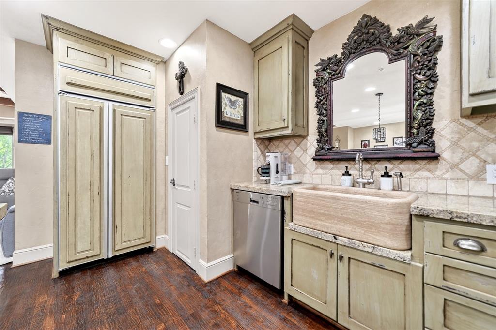 5055 Addison Circle, Unit 426 Addison, TX 75001 - Photo 14 of 38 a bathroom with a double vanity sink and mirror