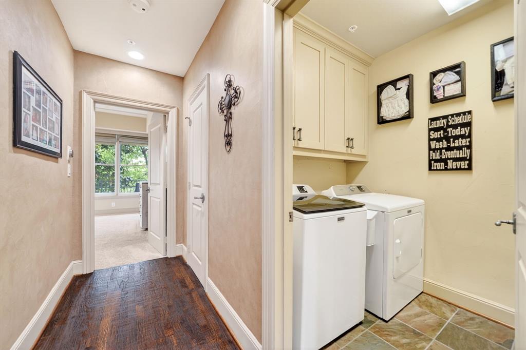 5055 Addison Circle, Unit 426 Addison, TX 75001 - Photo 29 of 38 a kitchen with a refrigerator and a stove