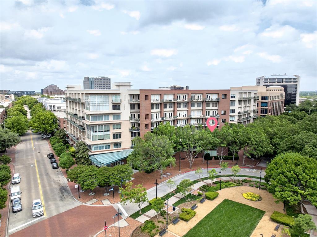 5055 Addison Circle, Unit 426 Addison, TX 75001 - Photo 38 of 38 a view of a city with tall buildings