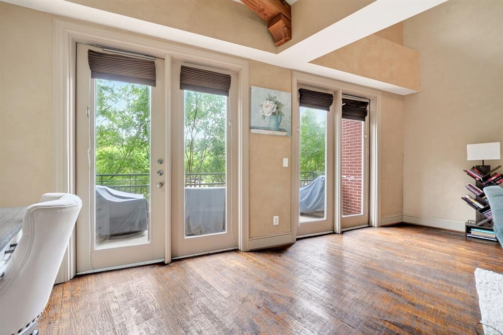 5055 Addison Circle, Unit 426 Addison, TX 75001 - Photo 4 of 38 a view of an empty room and window