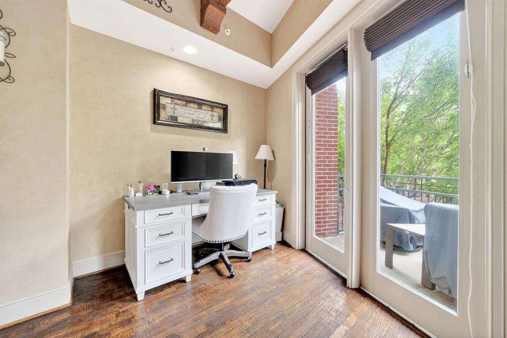 5055 Addison Circle, Unit 426 Addison, TX 75001 - Photo 10 of 38 a view of a livingroom with workspace and a window