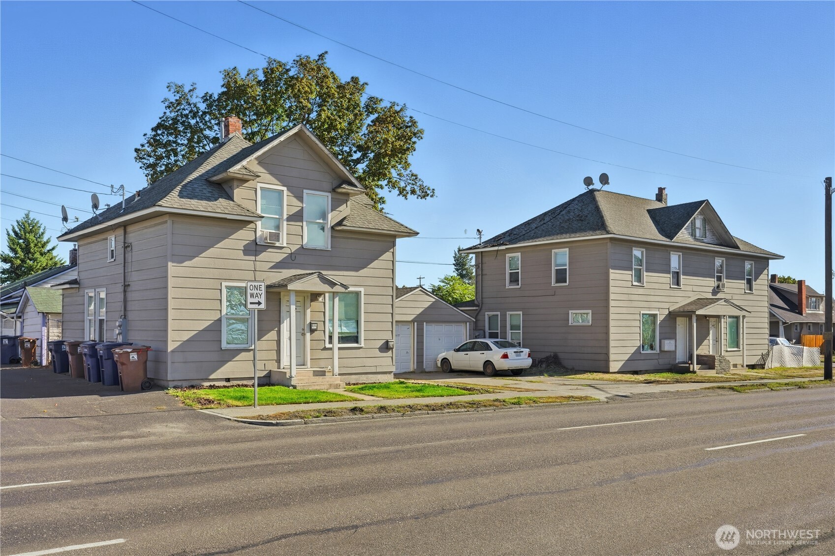 1704 North Ash Street Spokane, WA 99205 - Photo 1 of 23 a front view of a house with a yard