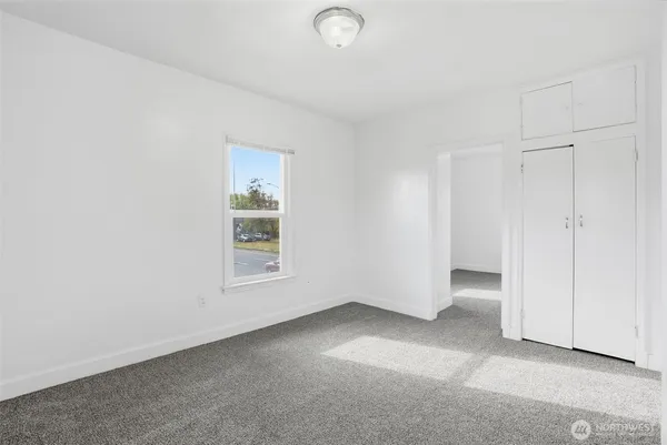 an empty room with windows