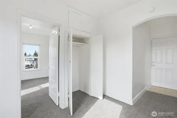 a view of entryway with white walls