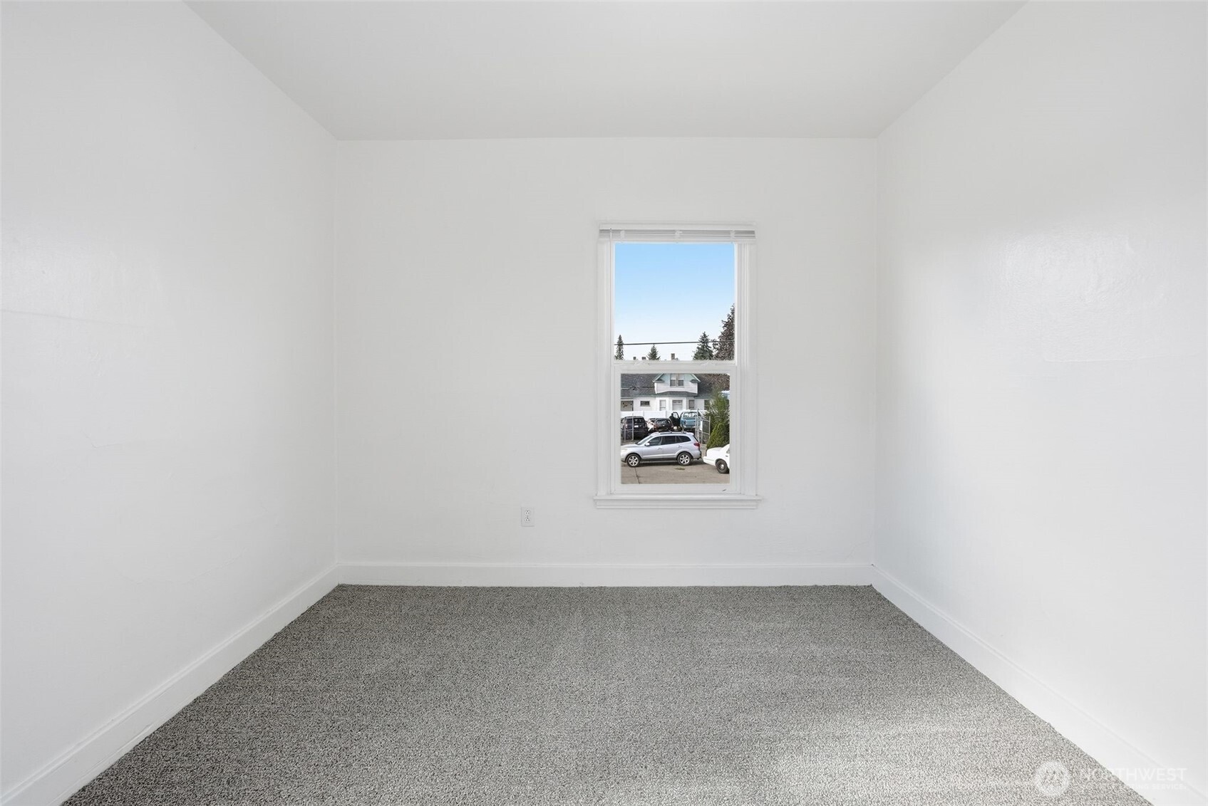 1704 North Ash Street Spokane, WA 99205 - Photo 14 of 23 a view of a small space with wooden floor and a window