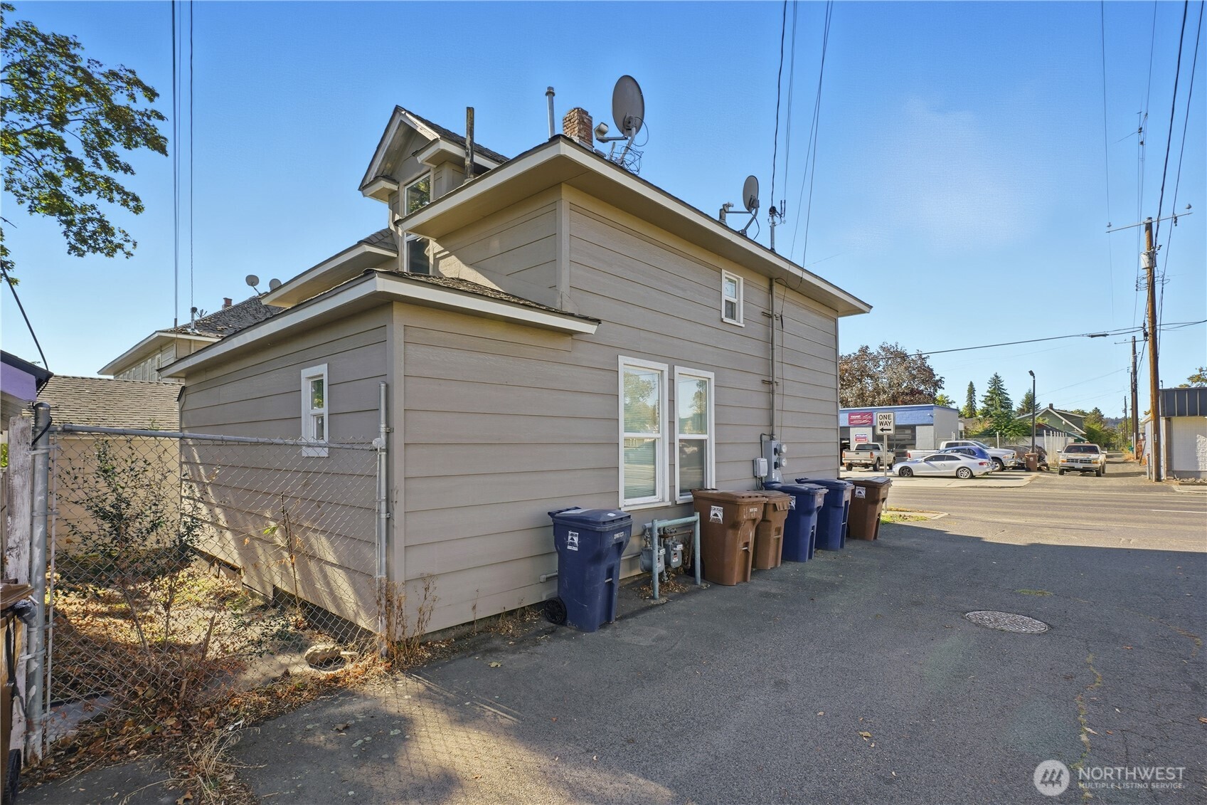 1704 North Ash Street Spokane, WA 99205 - Photo 19 of 23 a view of a house with a yard