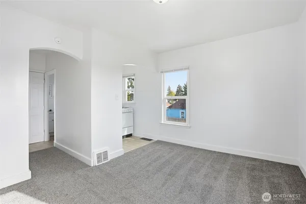 an empty room with windows