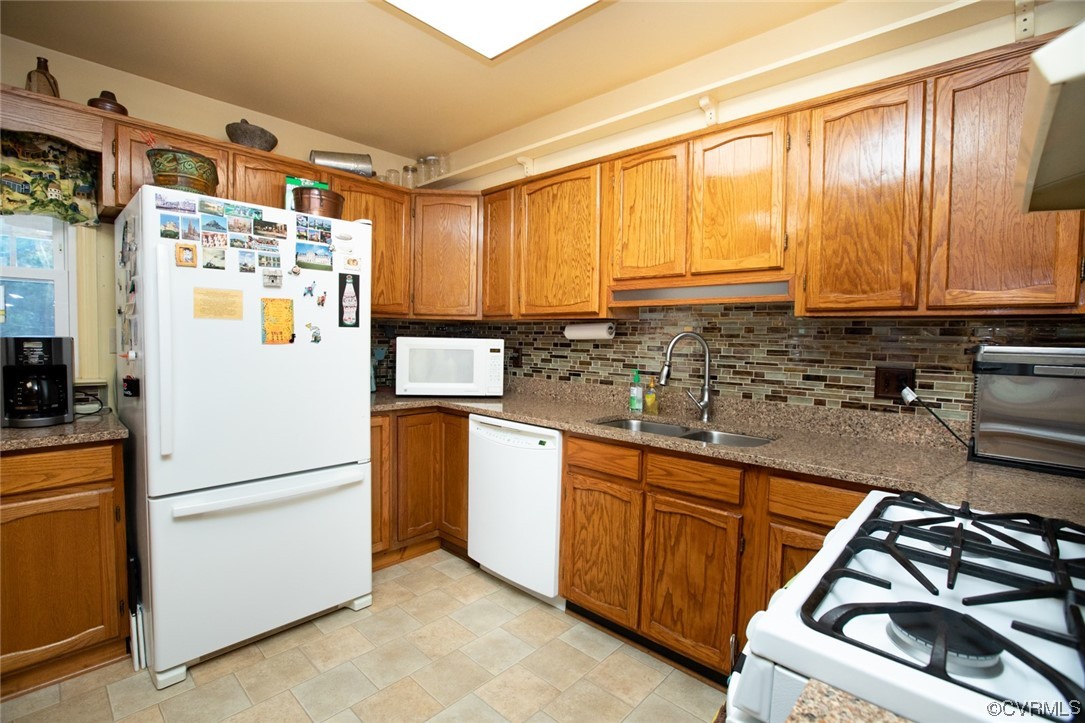 3384 Rice Creek Road Farmville, VA 23901 - Photo 14 of 50 a kitchen with stainless steel appliances granite countertop a refrigerator and a sink