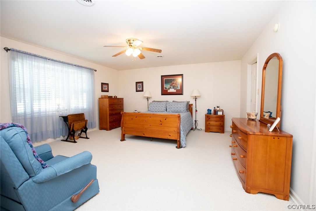 3384 Rice Creek Road Farmville, VA 23901 - Photo 20 of 50 a bedroom with furniture and a flat screen tv