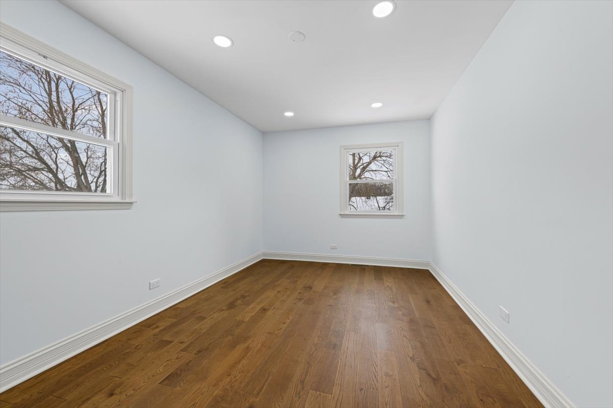 2527 Checker Road Long Grove, IL 60047 - Photo 16 of 32 an empty room with a window