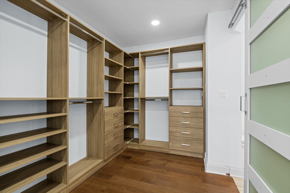 2527 Checker Road Long Grove, IL 60047 - Photo 24 of 32 a view of walk in closet with empty racks