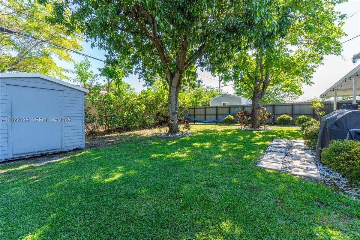 120 West 50th Street Hialeah, FL 33012 - Photo 18 of 22 a view of a backyard with a garden