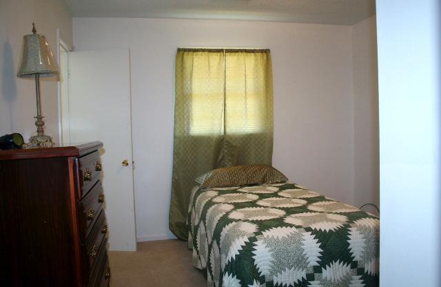 285 Smith Mill Road Fayetteville, TN 37334 - Photo 12 of 18 The 2nd bedroom has a half bath with shower. This could be the Master but is smaller.