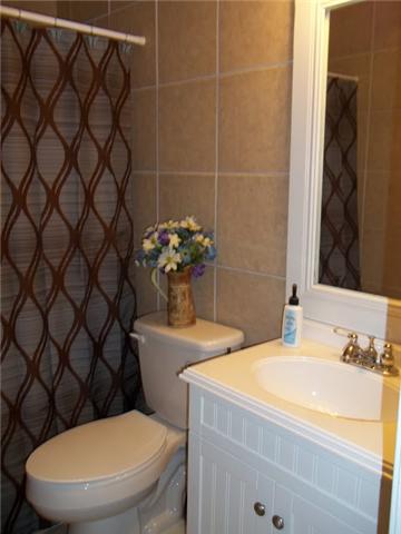 285 Smith Mill Road Fayetteville, TN 37334 - Photo 13 of 18 The main full bath of the home has a tiled shower.