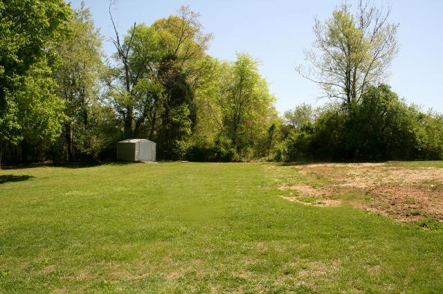 285 Smith Mill Road Fayetteville, TN 37334 - Photo 16 of 18 Another view of the back yard with one of the storage buildings.