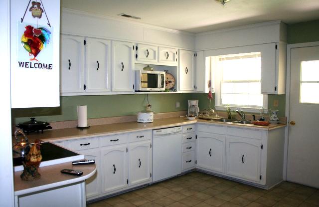 The Country Kitchen has plenty of cabinet space and counter space. 
