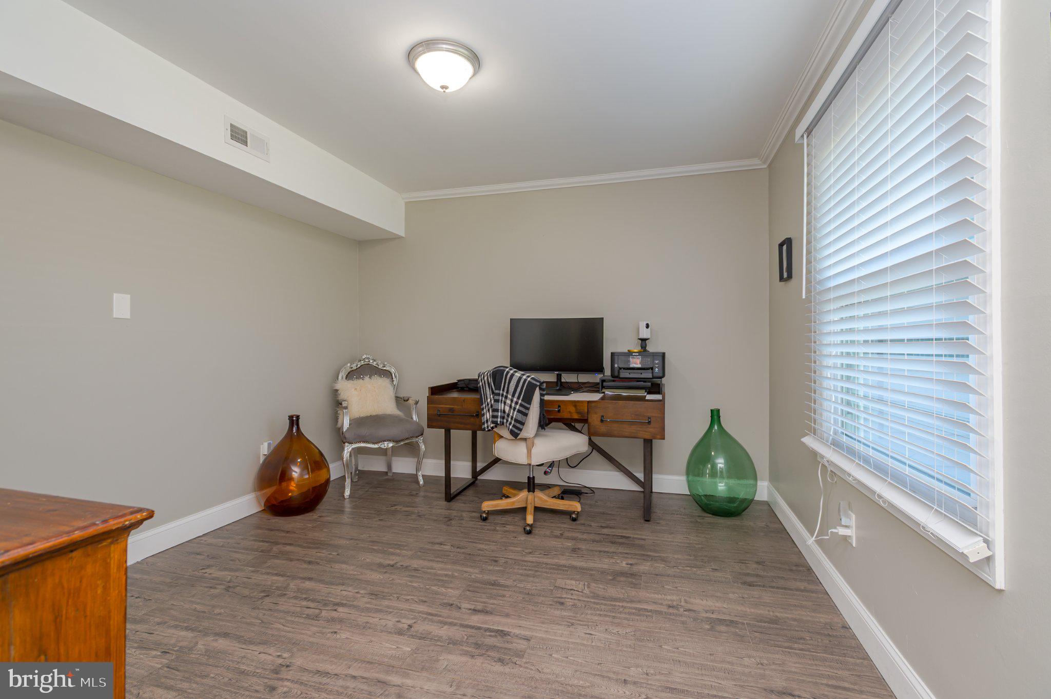 60 Midvale Lane Willingboro, NJ 08046 - Photo 14 of 24 a view of a workspace with furniture and a window