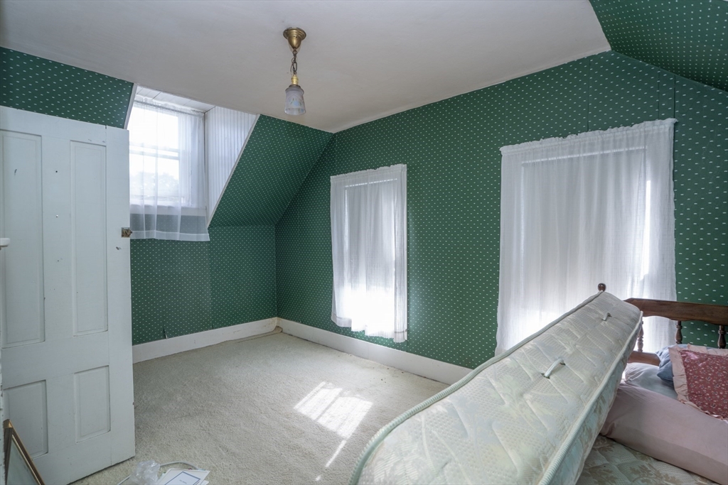 15 Beacon Street Amesbury, MA 01913 - Photo 14 of 41 a view of livingroom with furniture and windows
