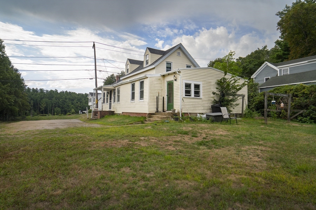 15 Beacon Street Amesbury, MA 01913 - Photo 20 of 41 a front view of house with yard and green space