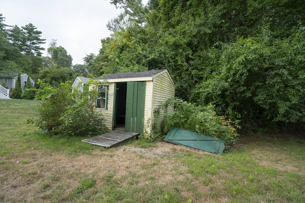 15 Beacon Street Amesbury, MA 01913 - Photo 24 of 41 a view of a house with backyard and garden