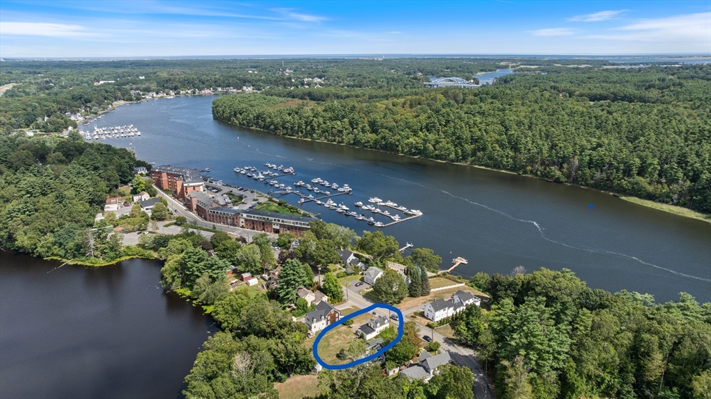 15 Beacon Street Amesbury, MA 01913 - Photo 3 of 41 an aerial view of a residential houses with outdoor space and trees all around