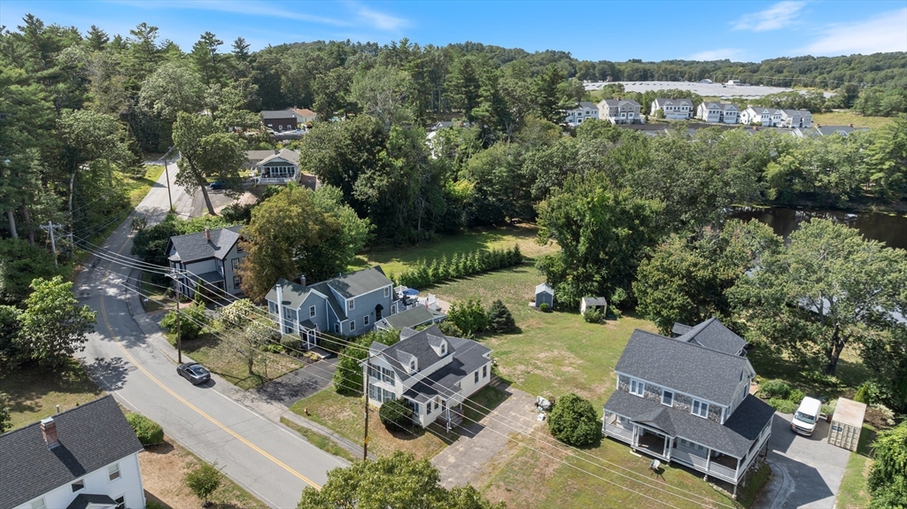 15 Beacon Street Amesbury, MA 01913 - Photo 31 of 41 an aerial view of a house with a yard