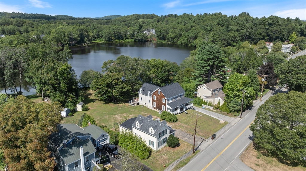 15 Beacon Street Amesbury, MA 01913 - Photo 32 of 41 an aerial view of a house with a garden