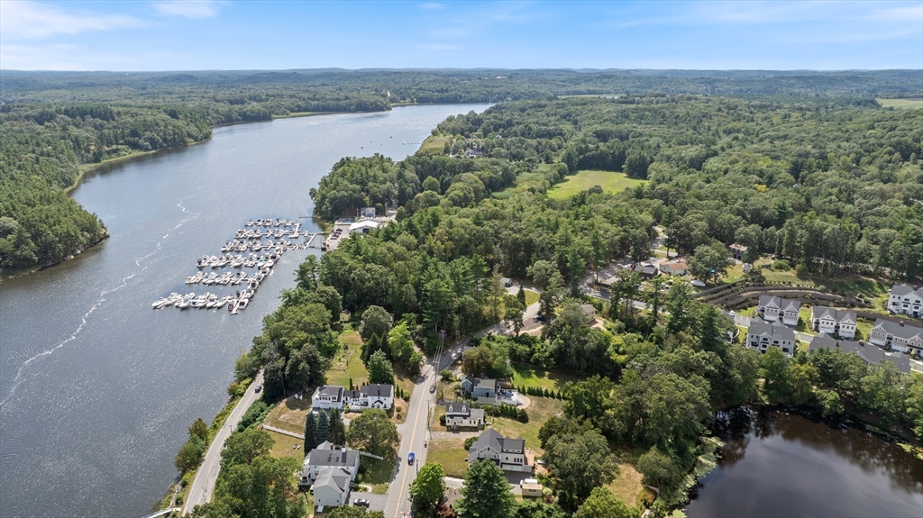 15 Beacon Street Amesbury, MA 01913 - Photo 38 of 41 an aerial view of a residential houses with outdoor space and trees all around
