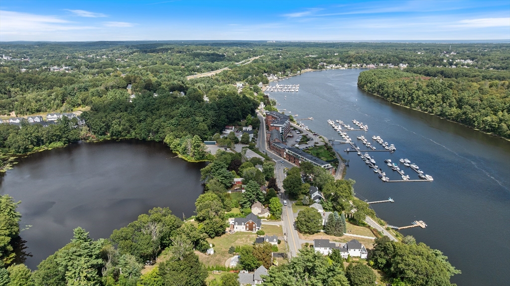 15 Beacon Street Amesbury, MA 01913 - Photo 41 of 41 an aerial view of a residential houses with outdoor space and trees