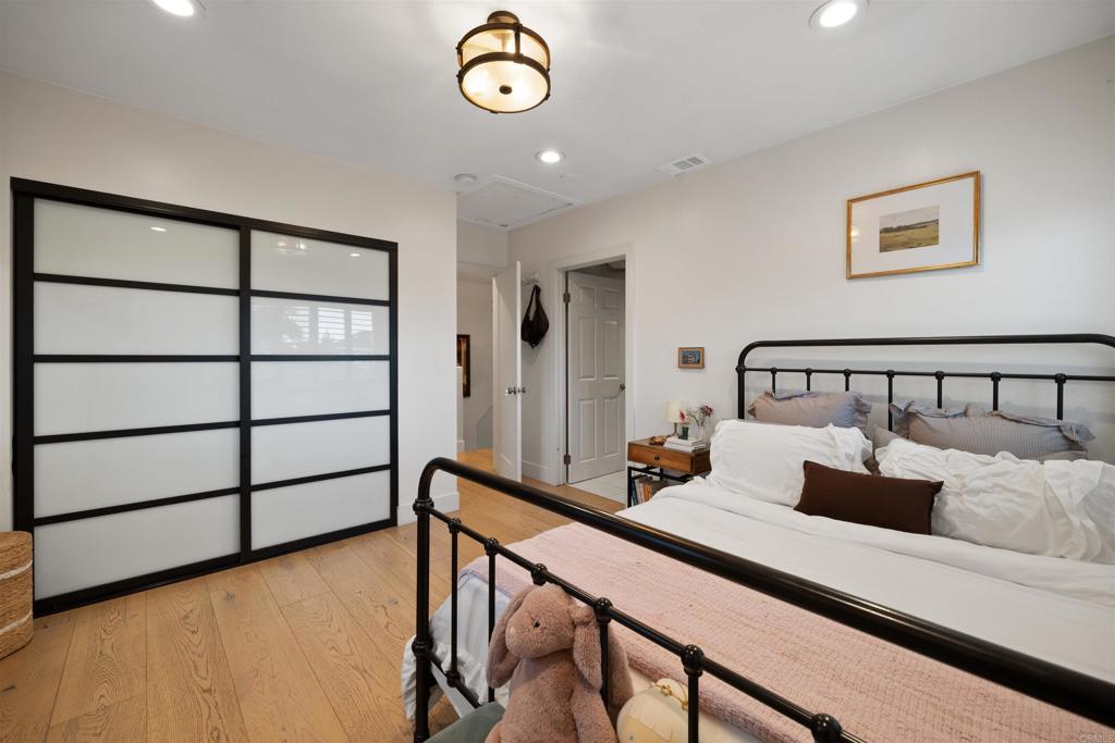 7965 4th Place Downey, CA 90241 - Photo 21 of 41 a bedroom with furniture and a window