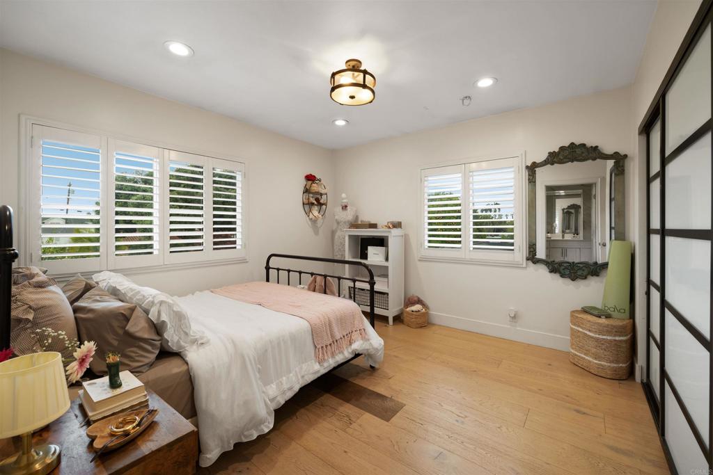 7965 4th Place Downey, CA 90241 - Photo 26 of 41 a bedroom with a bed dresser and a window
