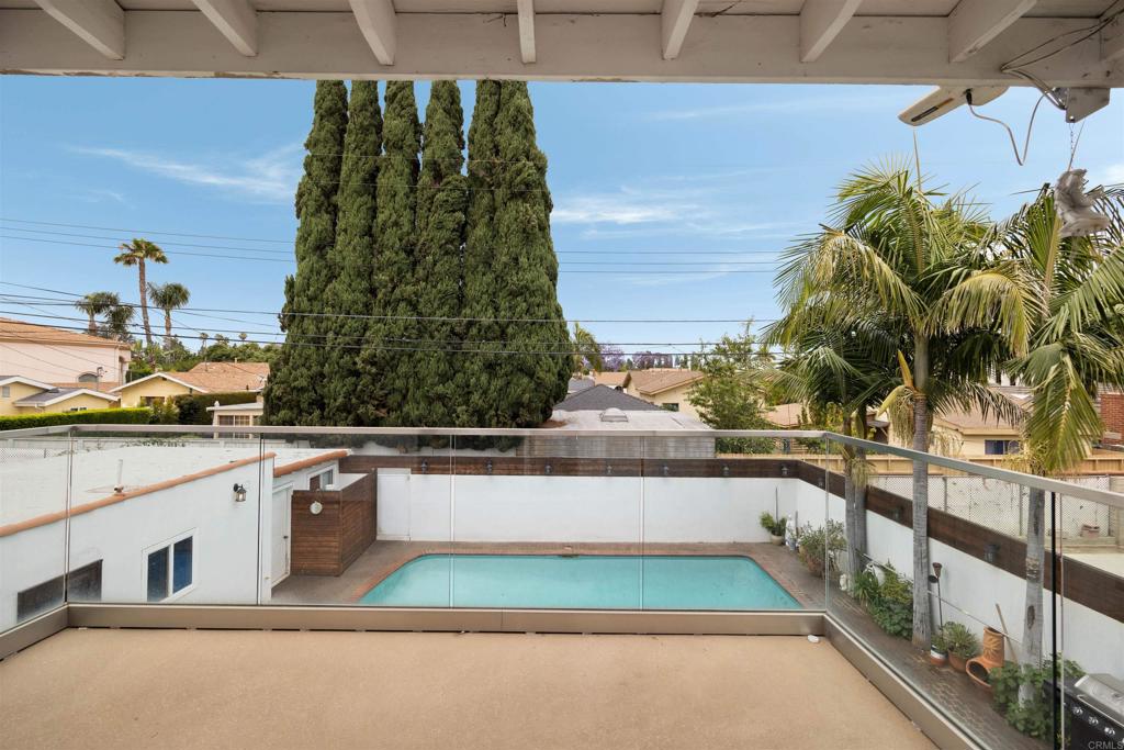 7965 4th Place Downey, CA 90241 - Photo 31 of 41 a view of swimming pool from a balcony