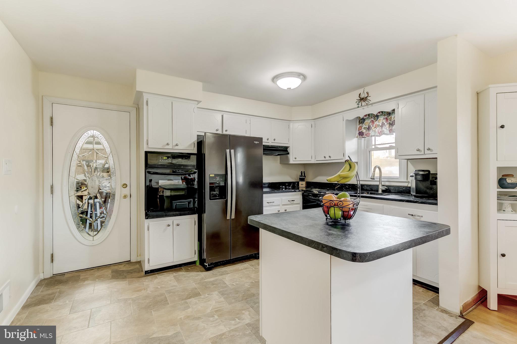 9502 Buckhorn Road Baltimore, MD 21234 - Photo 11 of 39 Bright and cheery Kitchen with tile flooring