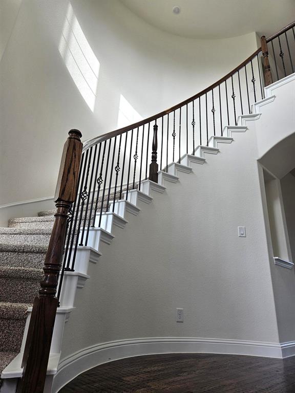 1453 Enloe Road Howe, TX 75459 - Photo 15 of 33 a view of staircase with wooden floor and staircase